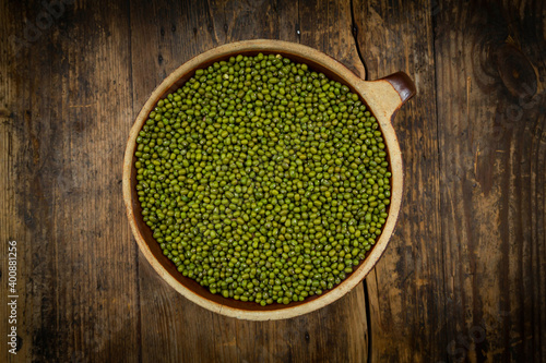 Bowl of green organic¬†mung beans photo