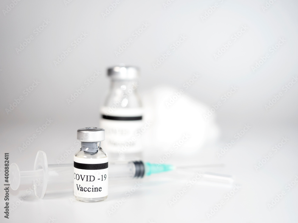 Medical plastic syringe in water color with glass vial with coronavirus vaccine COVID-19 isolated in white background. Vaccination concept. Medical plastic syringe in water color with glass vial with coronavirus vaccine COVID-19 isolated in white background. Vaccination concept.