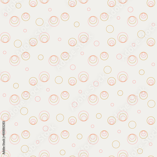 Seamless pattern of circles on a cream background