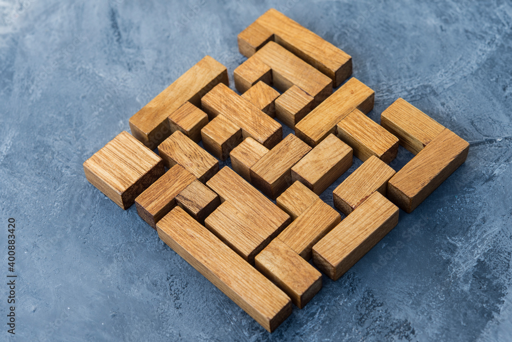 © Laia Divols Escude/Westend61 - Assembled pieces of wooden puzzle
