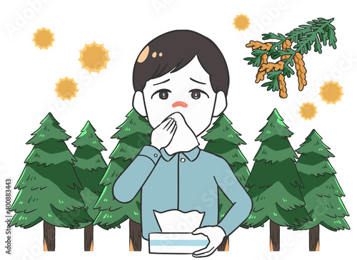 花粉症で鼻をかむ　男性　スギの木