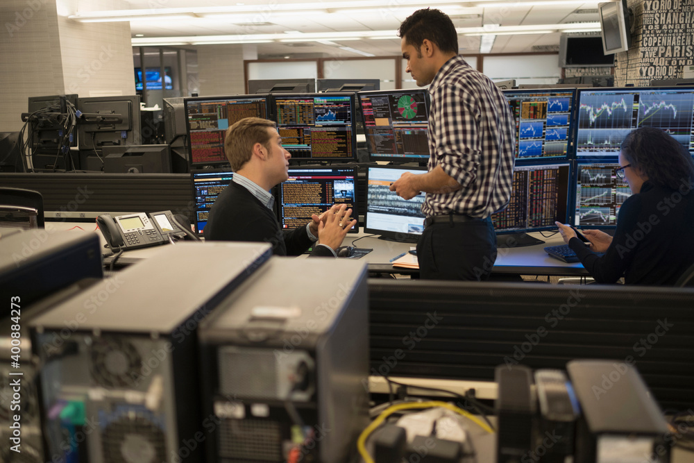 Young traders working in stock market