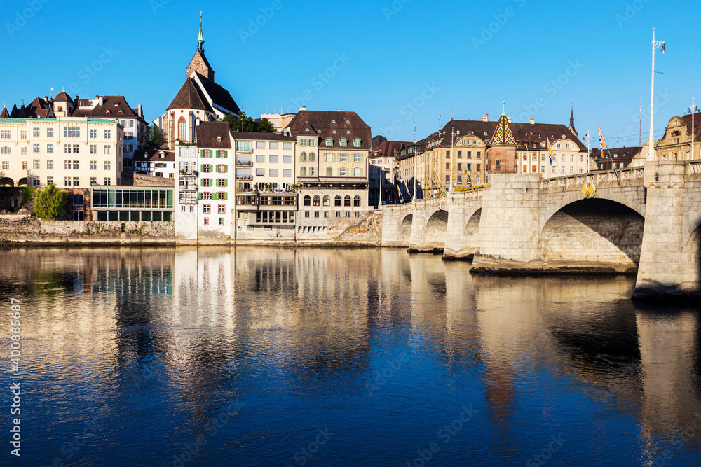 Switzerland, Basel, Basel-Stadt, Houses by Rhine River and stone bridge Switzerland, Basel, Basel-Stadt, Houses by Rhine River and stone bridge