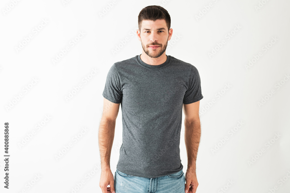 Portrait of a young hispanic man with a serious expression Portrait of a young hispanic man with a serious expression