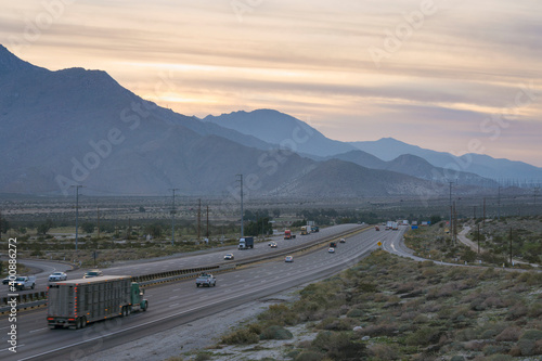 I-10 highway along mountains at sunset photo