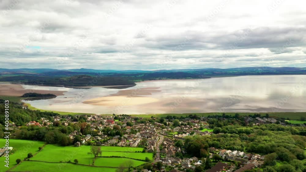 Aerial landscape of a costal bay in the English countryside showing rural town, on a bright summers day. Aerial landscape of a costal bay in the English countryside showing rural town, on a bright summers day.
