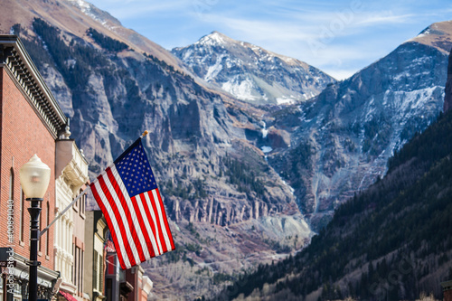 The famous American flag, stars and stripes, flying in the wind in Telluride, Colorado, USA