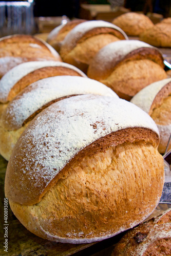 Rows of fresh white bread rolls