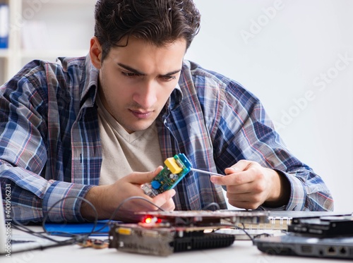 Computer hardware repair and fixing concept by experienced techn photo