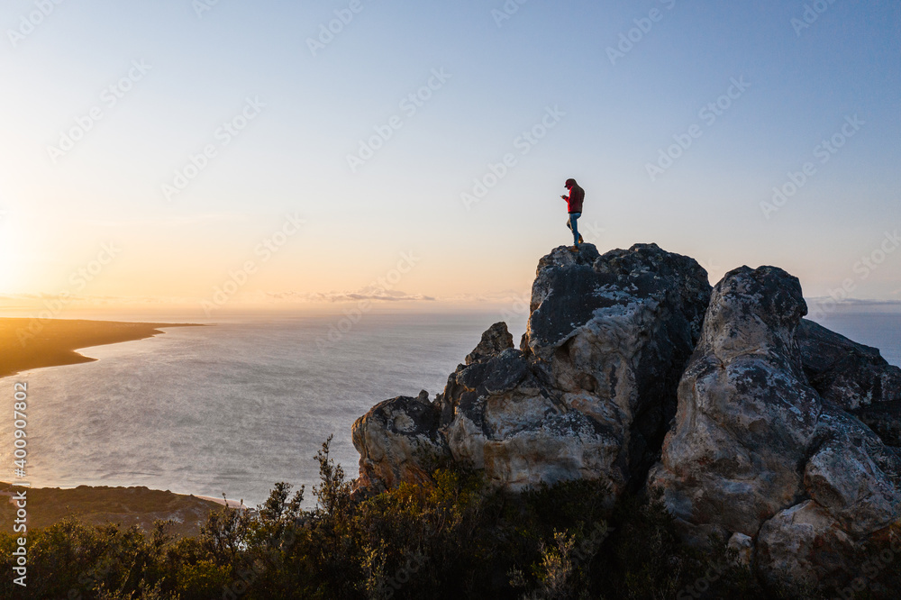 man on the top of a mountain. 