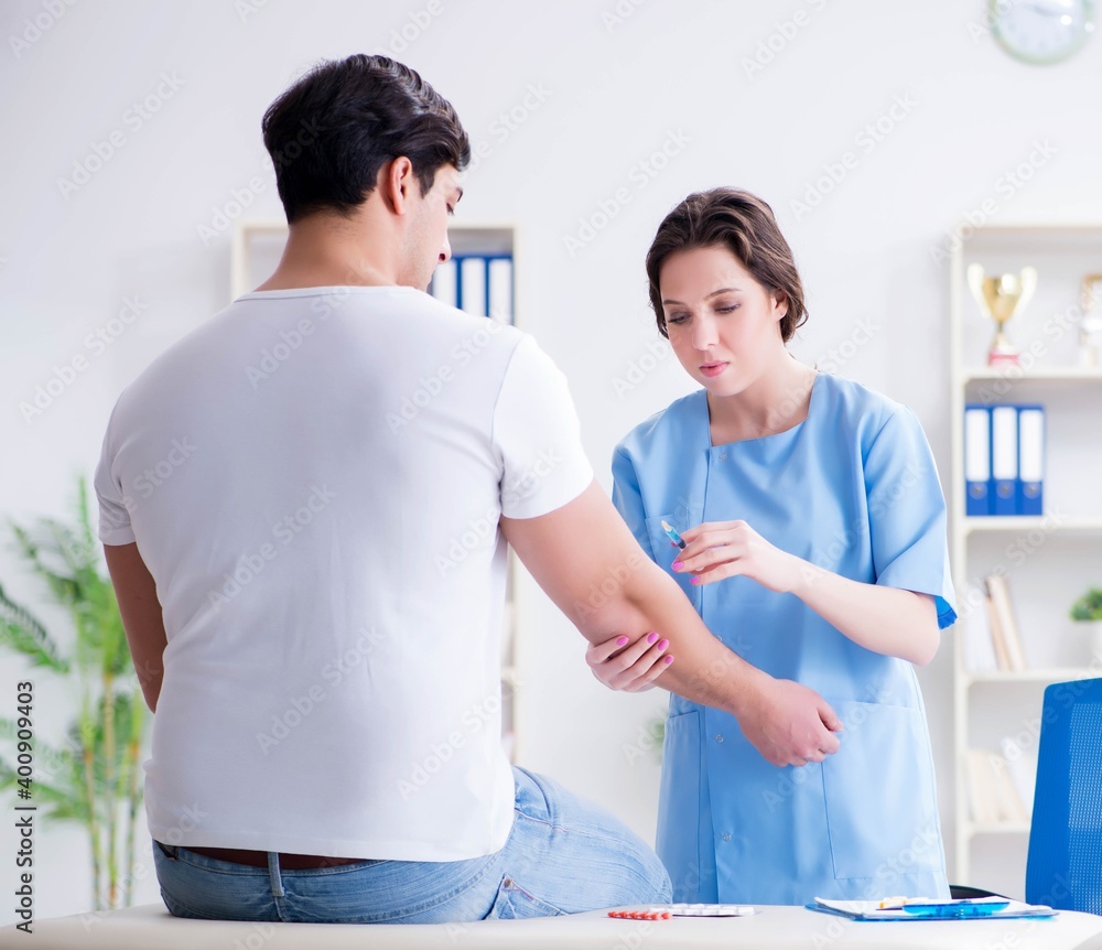 Fototapeta premium Man visiting female doctor in medical concept