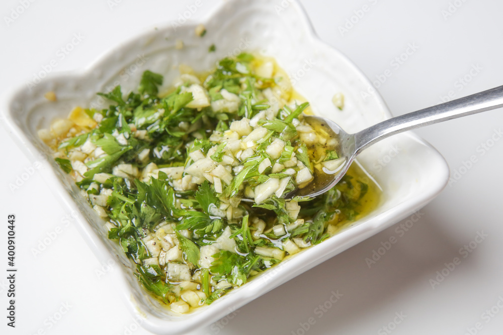 Classic Mediterranean fish dressing. Olive oil, garlic and parsley
Classic Mediterranean fish dressing. Olive oil, garlic and parsley