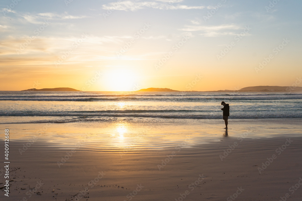 Man flying his drone at sunset in Esperance. 