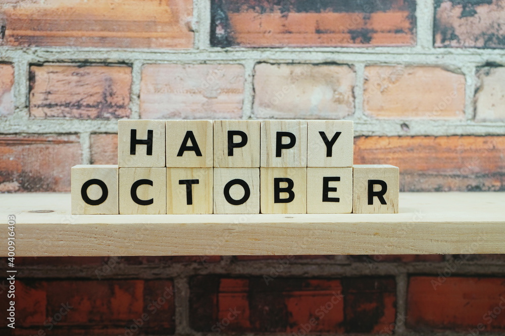 Fototapeta premium Happy October alphabet letter on shelves wooden background