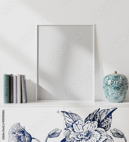 mock up white blank poster frame in modern orient style interior with white wall, books and porcelain vase,  japaneese style, 3d rendering photo