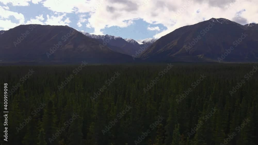 Scenic landscape view of Kluane National park forest and mountains Scenic landscape view of Kluane National park forest and mountains
