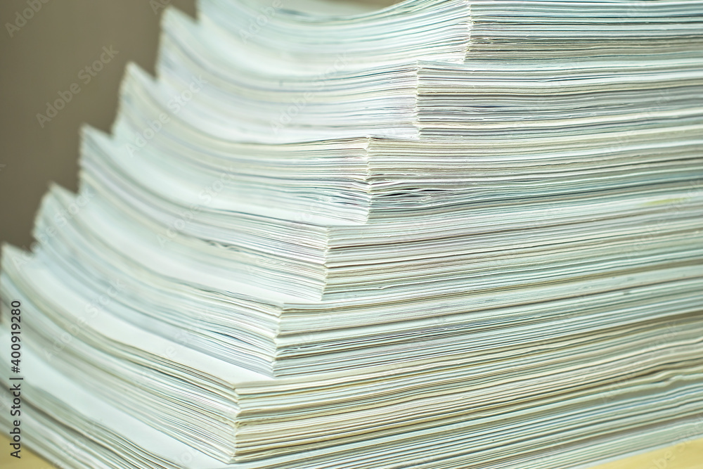 bundles bales of paper documents. stacks packs pile on the desk in the office bundles bales of paper documents. stacks packs pile on the desk in the office