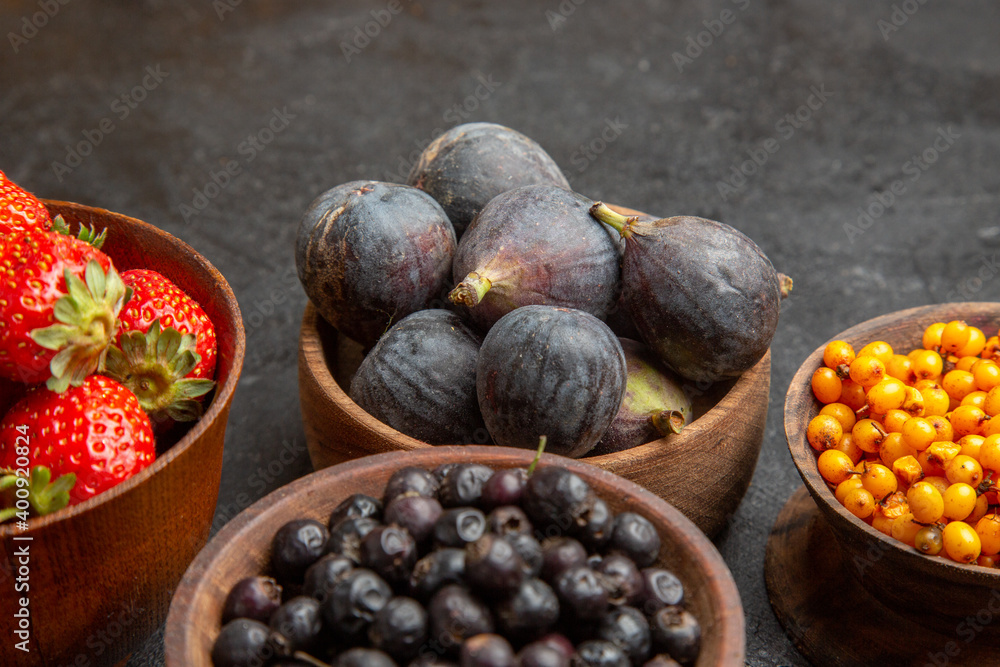 front view different fresh fruits inside plates on the dark background fruit color photo many mellow juice