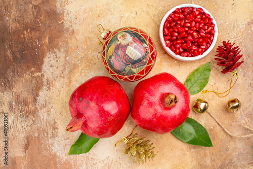 top view fresh red pomegranates on light background mellow fruit photo juice xmas color