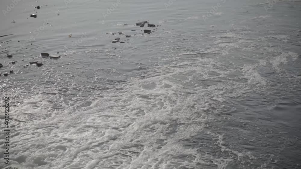 Trash Flowing In Industrial Waste Water, Pollution Contaminating World Environment Trash Flowing In Industrial Waste Water, Pollution Contaminating World Environment