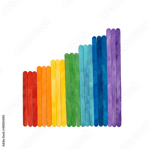 Rainbow color wooden sticks on white. Multicolored abstract stairs, lgbt concept.