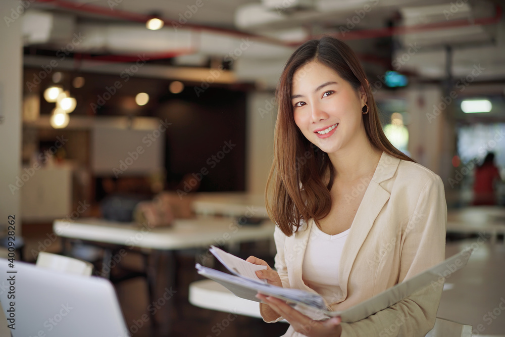 Smiling confident business woman entrepreneur standing in boardroom. Smiling confident business woman entrepreneur standing in boardroom.