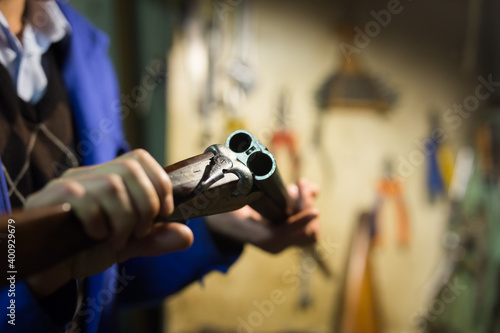 Quadro em tela Close-up of break-action of horizontal double-barreled hunting shotgun in hands