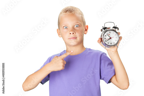 School boy showing alarm clock