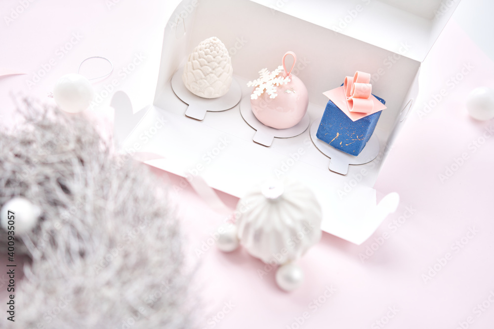 Merry Christmas card. Variety of sweet delicious cakes. Fir branches on a gray background. Merry Christmas card. New year mood Merry Christmas card. Variety of sweet delicious cakes. Fir branches on a gray background. Merry Christmas card. New year mood