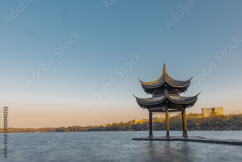 Sunrise view of Jixian pavilion, the landmark at the west lake in Hangzhou, China.