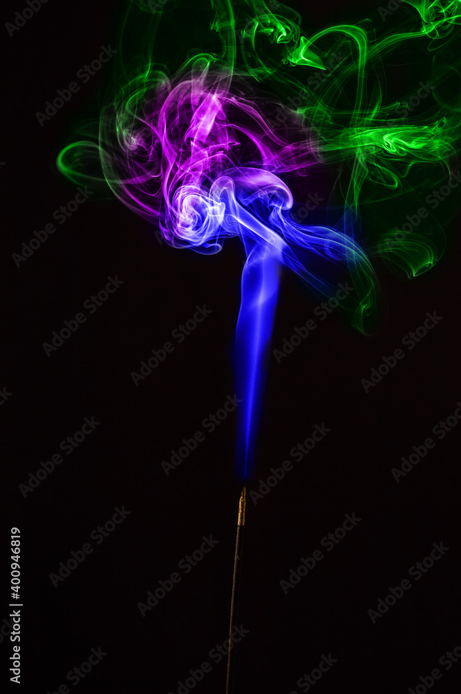 colored smoke on a black background colored smoke on a black background