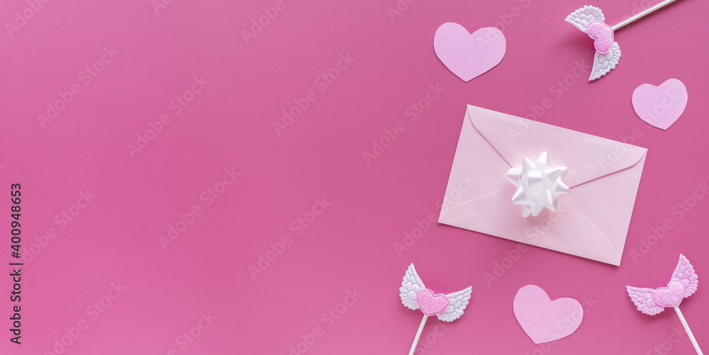 Pink hearts, toppers, envelope with letter on pink background. Valentine's day banner. Romantic, Valentines concept Flat lay, top view, copy space.