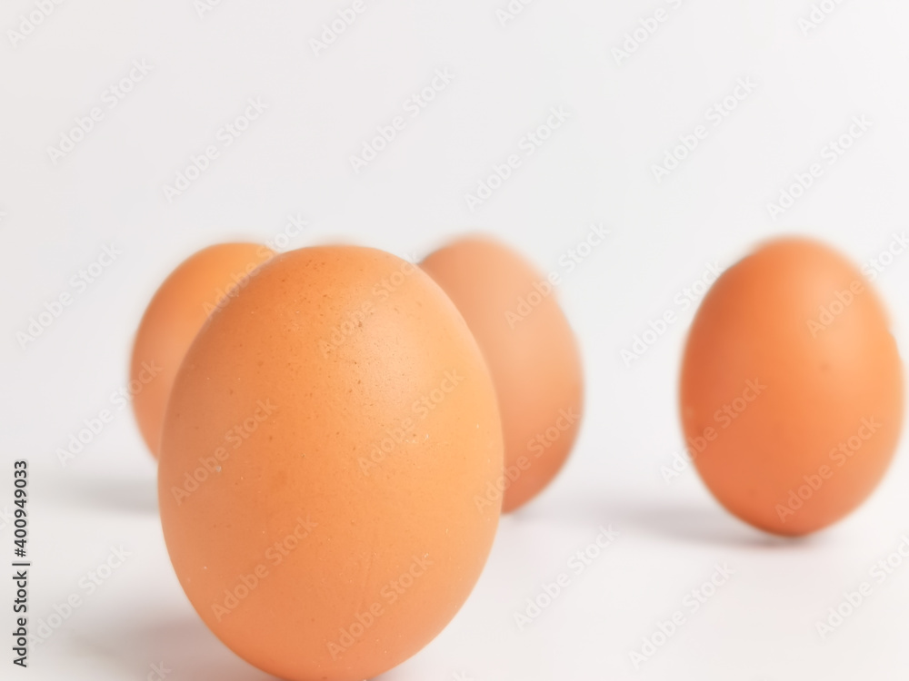 A bunch of chicken eggs isolated on white background. A bunch of chicken eggs isolated on white background.