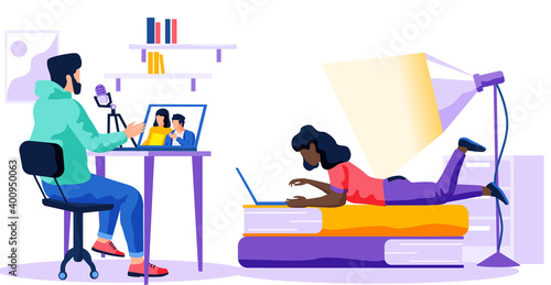 The girl lies on books and works on a laptop. A man with a microphone is recording a voice. People spend time in a recording studio. Voice and speech training. Guy with the computer is making music