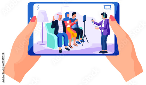 People of arab nationality give interviews on camera. Man with phone in hands is recording a video massage from people and smiling. Man and woman are broadcasting online with using a mobile phone