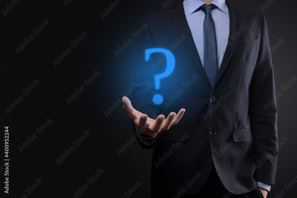 Businessman man hand hold interface question marks sign web. Ask quiestion online, FAQ concept, what where when how and why, search information on internet Businessman man hand hold interface question marks sign web. Ask quiestion online, FAQ concept, what where when how and why, search information on internet