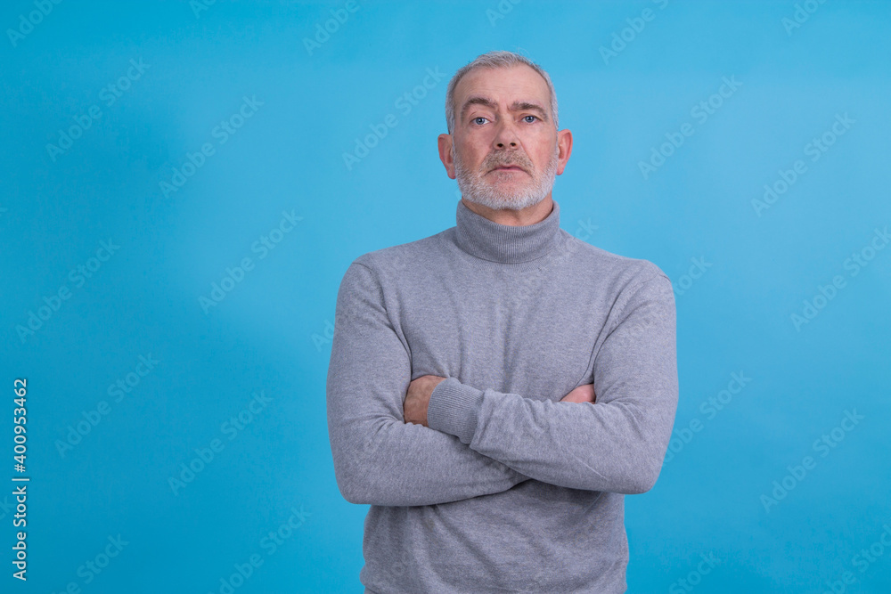 Serious authoritative man with folded arms Serious authoritative man with folded arms