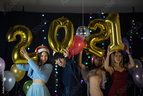 Happy Asian friends celebra...
