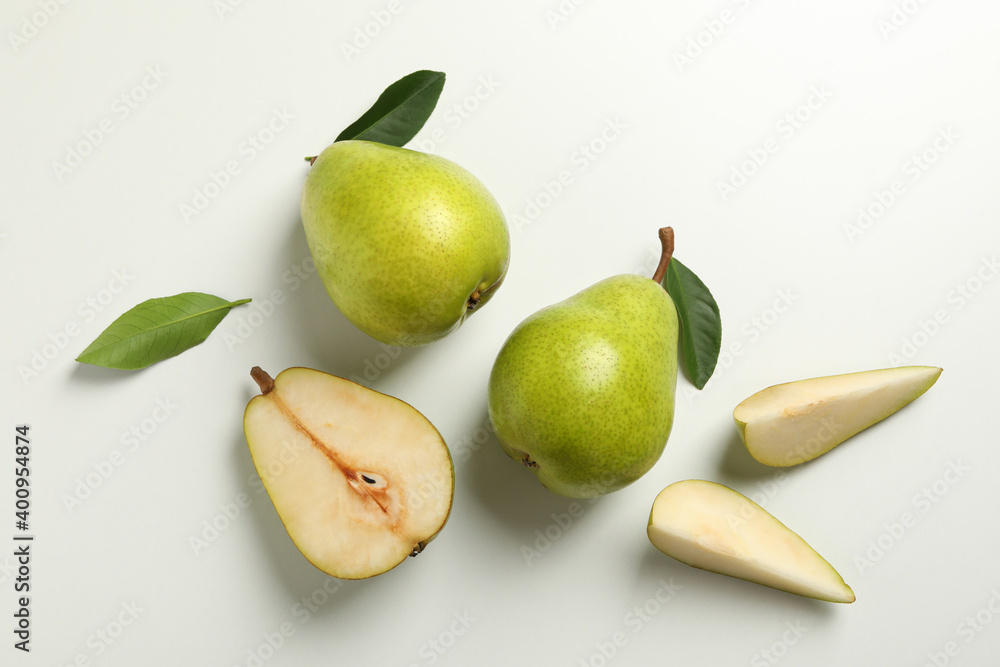 Fresh green pears on white background, top view Fresh green pears on white background, top view