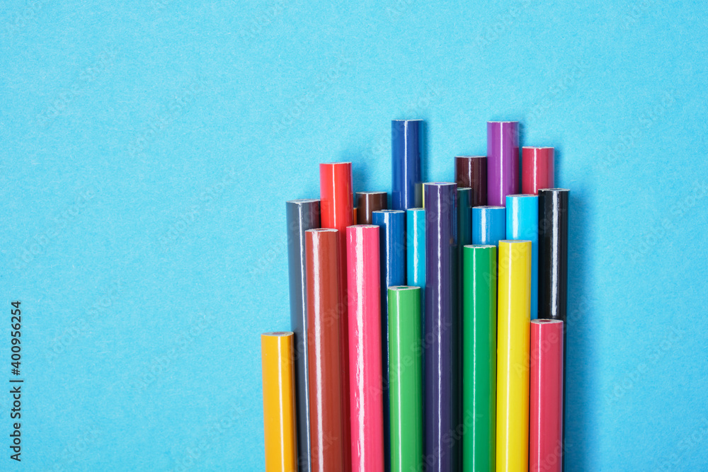 color pencils on blue background copy space color pencils on blue background copy space