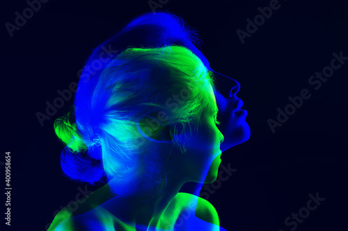 Night. Multiple portrait with glitch duotone effect. Multiple exposure, abstract fashionable beauty photo. Young beautiful female model posing. Youth culture, composite image, fashionable people. © master1305