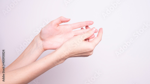 Close up of tremor (shaking) hands of Middle-aged women patient with Parkinson's disease. Mental health and neurological disorders.