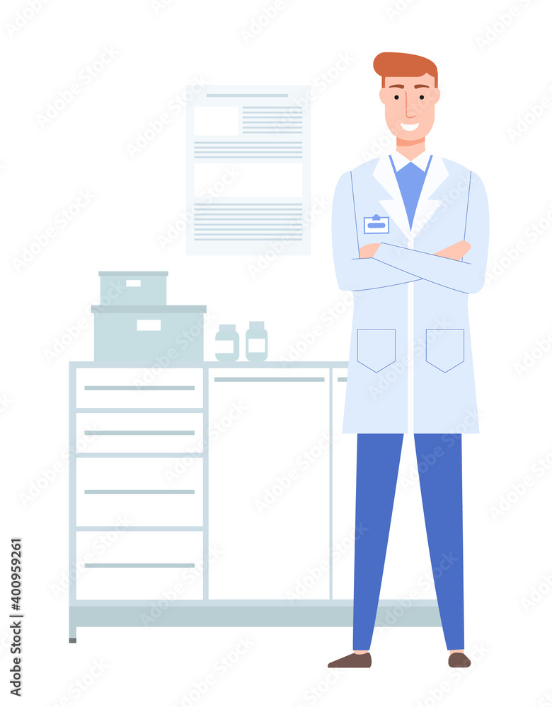 Doctor in a white coat with a badge works in the lab. Redhead therapist in medical office. Male character smiles and standes with folded arms on his chest. Working day and pastime in medical facility