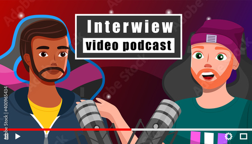 Interview video podcast screensaver of videotape recording male bloggers tell about computer games sitting in an armchair recording video with microphones, creating content about their hobby