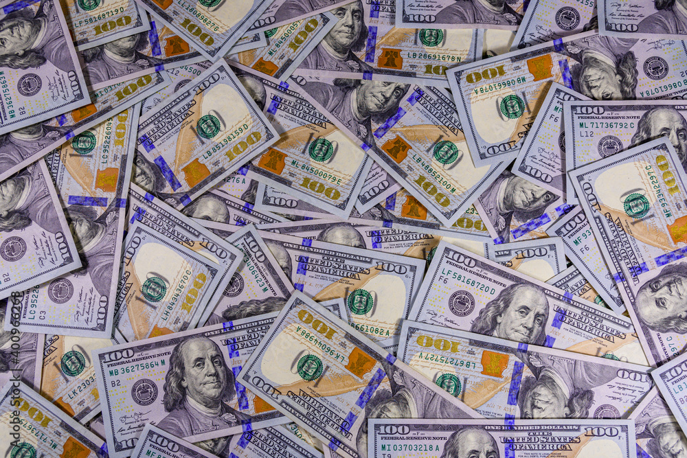 Fototapeta premium Background of one hundred dollar banknotes