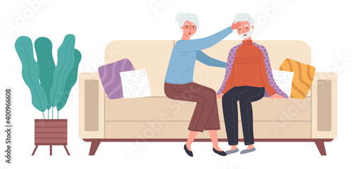 Wife puts her hand to the husband s forehead to measure his temperature on white background. Elderly man having a cold and sitting on the sofa. Character does not feel well during the illness