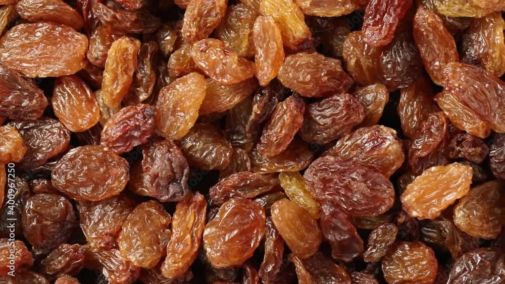 Healthy sweet sundried raisins close up full frame Healthy sweet sundried raisins close up full frame