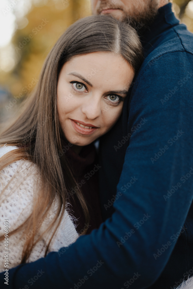 Young adult couple in love in autumn Park