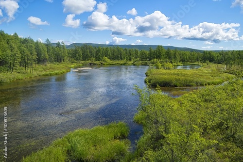 Taiga river with crystal clear water. Natural spawning ground for Pacific salmon. Khabarovsk Krai, far East, Russia.