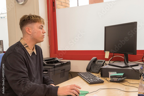 young intern working in an office